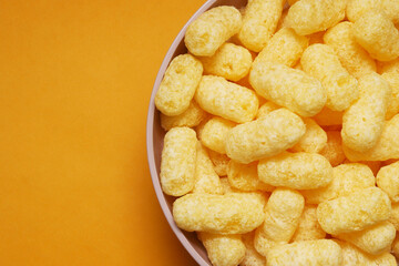 Sweet corn sticks in a bowl. Shallow depth of field