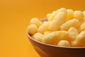 Sweet corn sticks in a bowl. Shallow depth of field
