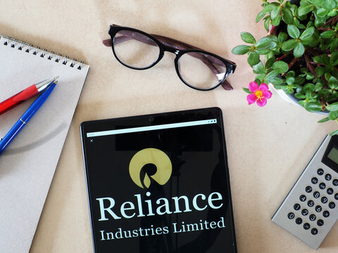 In this photo illustration,  Reliance Industries Limited logo seen displayed on a tablet