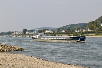 Cargo ship on the river with low water level