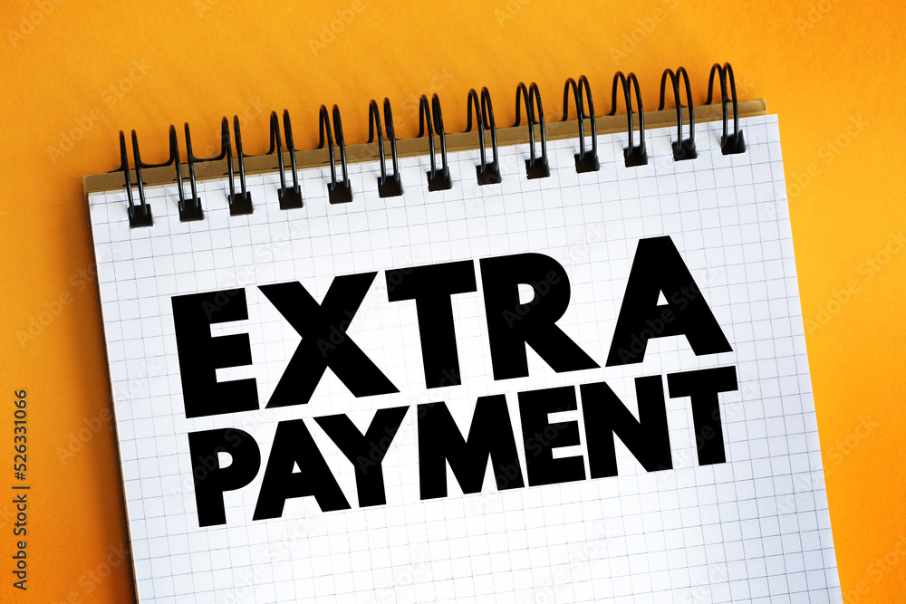 Poster extra payment text on notepad, concept background