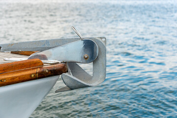 Bow of a sailing boat with an anchor