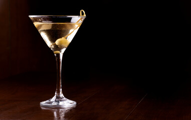 martini cocktail glass with olive. James Bond 007's Vesper