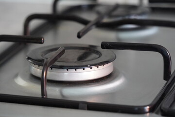 Closeup of cooker gas hob, domestic kitchen stove top, gas cooker