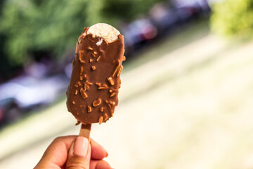 Woman holding chocolate ice cream