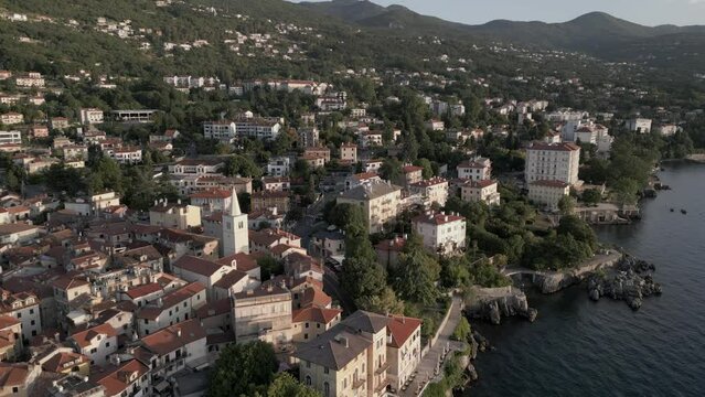 Aerial shot of St. George's Church and the town of Lovran at daybreak, Lovran, Eastern Istria