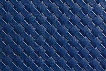 Navy blue leather woven texture background. Navy blue braided leather texture. Navy blue texture for background.