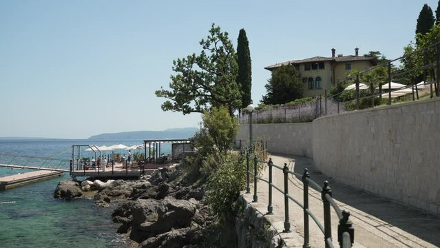 Cafe bar and coastline between Lovran and Ika and Adriatic Sea, Lovran, Eastern Istria