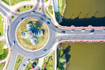 Aerial view of a traffic roundabout in Gorzów Wielkopolski town city at river Warta in Poland - obrazy, fototapety, plakaty
