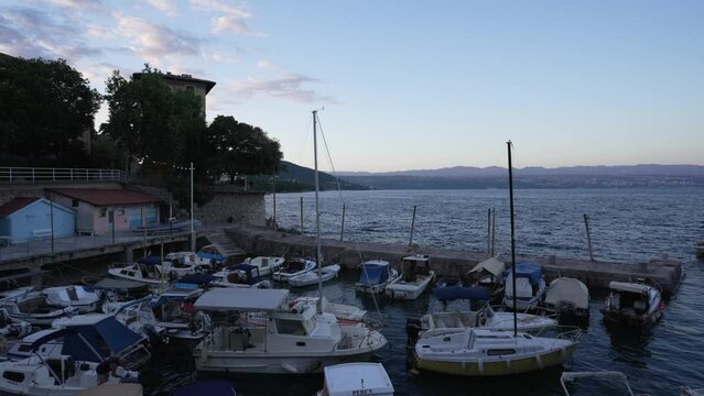 Harbour and the town of Lovran at sunset, Lovran, Eastern Istria