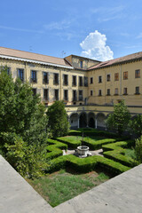 Fototapeta premium The cloister of the church of Santa Maria la Nova, now a museum, in Naples, Italy.