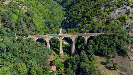 Fototapeta na wymiar Railway bridge over a ravine.