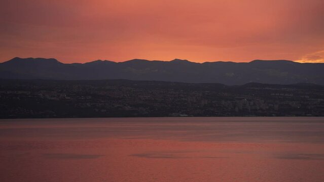 Kvarner Bay across to Rijeka from Lovran and red sky after sunset, Kvarner Bay