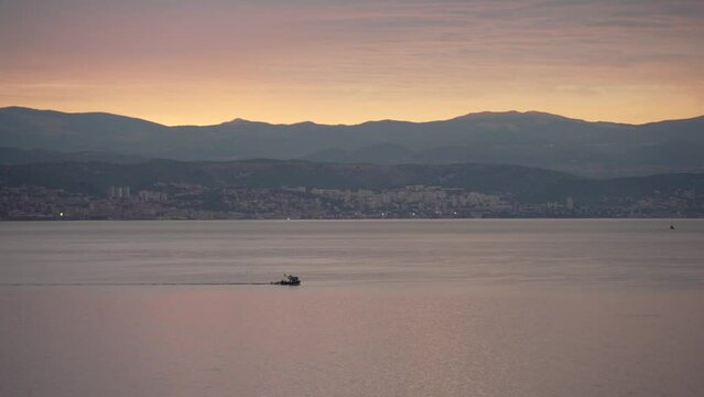 Kvarner Bay across to Rijeka from Lovran and red sky after sunset, Kvarner Bay