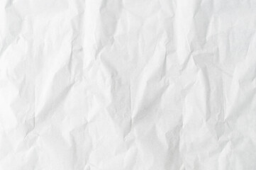 Wrinkled or crumpled white stencil paper used for background texture