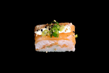 brazilian japanese food isolated on black background brazilian rice and salmon sushi.