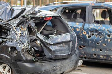 Car riddled with bullets. War of Russia against Ukraine. A car of civilians shot by the Russian...
