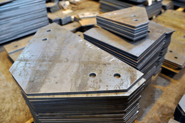 Fototapeta na wymiar Metal cutting. Warehousing of finished parts with marking.
