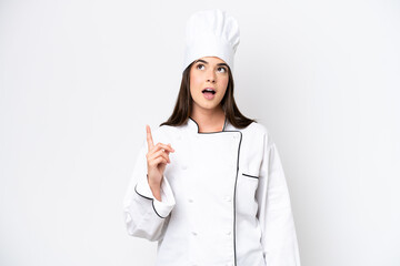 Young Brazilian chef woman isolated on white background thinking an idea pointing the finger up