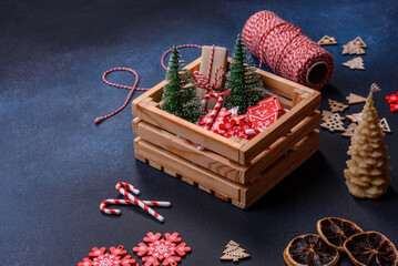 Christmas composition made of christmas decoration on a dark background.