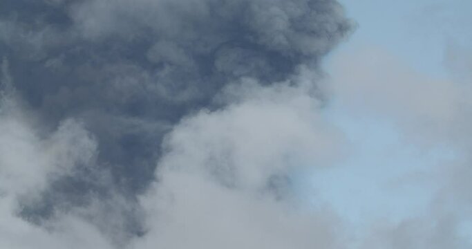 Detail of volcanic ash spreading into the atmosphere