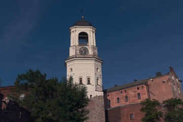 A view on Clock tower in old town by summer day