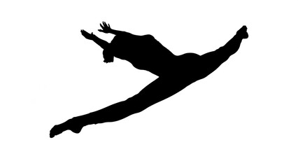 Silhouette of young woman practicing yoga