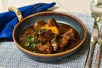 Sauteed beef trips with whipped yukons, mushrooms, leeks