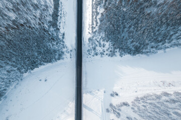 top view of the bridge over the river in winter. winter landscape view ds copter