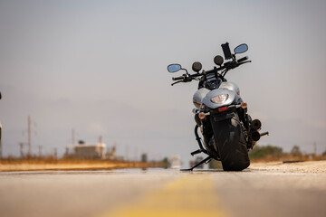 A classic motorcycle on the desert road