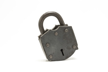 Locked antique or vintage padlock lock to indicate security, safety, loss prevention and precaution