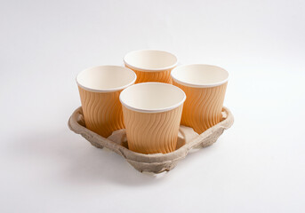 Empty disposable paper cups isolated on a white background