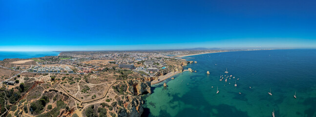 panoramic Ponta da Piedade with over rocks near Lagos in Algarve, Portugal. Ponta da Piedade,...