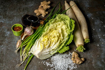 Napa cabbage or Chinese cabbage Fresh ripe chinese cabbage on a stone table, top view