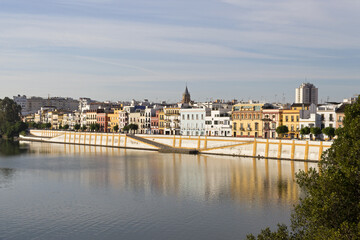 Fototapeta na wymiar Triana District by the Guadalquivir river in the city of Seville, Spain.