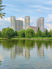 Fototapeta na wymiar Green summer in the new Butovo quarter in the south of Moscow