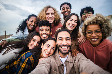Multiracial young group of happy people taking selfie portrait - Millennial diverse friends laughing and having fun together - obrazy, fototapety, plakaty