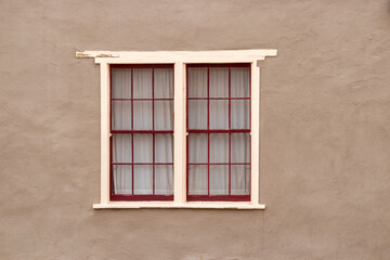 A painted window on the exterior of a building