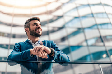 Businessman in front of the building