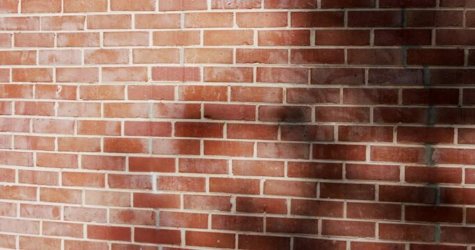 Abstract patterns ans textures - old ageing cracked red bricks wall