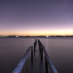 Fototapeta premium Old pier at sunset