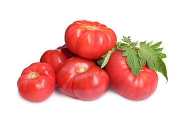 Fresh ripe red tomatoes with leaves on white background