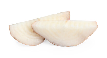 Pieces of sugar beet on white background