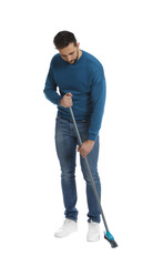 Handsome man with broom on white background