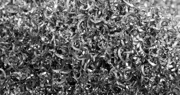 Abstract textures and patterns - Scrap metal shavings swirls. Steel scrap materials recycling.