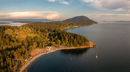 Sunset Aerial View of the West Side of Lummi Island, Washington. Located in the Salish Sea amid the...