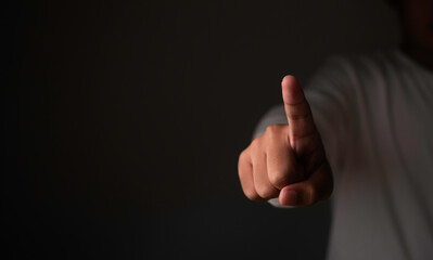 Businessman pointing finger button for virtual screen copy space