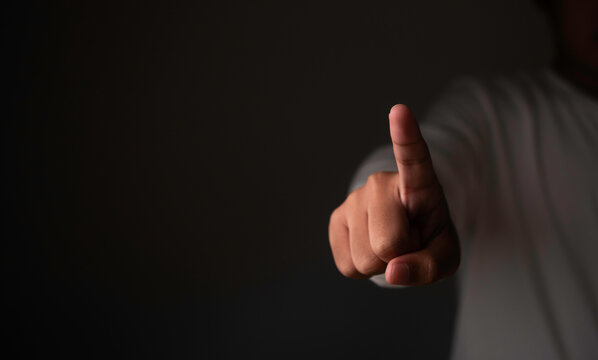Businessman pointing finger button for virtual screen copy space