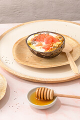 Yogurt with grapefruit, granola, chia and honey