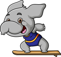 The cute elephant is playing with surfboard on the beach